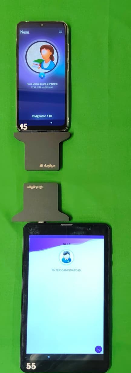 Invigilator phone and candidate tablet, each with a CORTEX Relay Card in its port, held apart