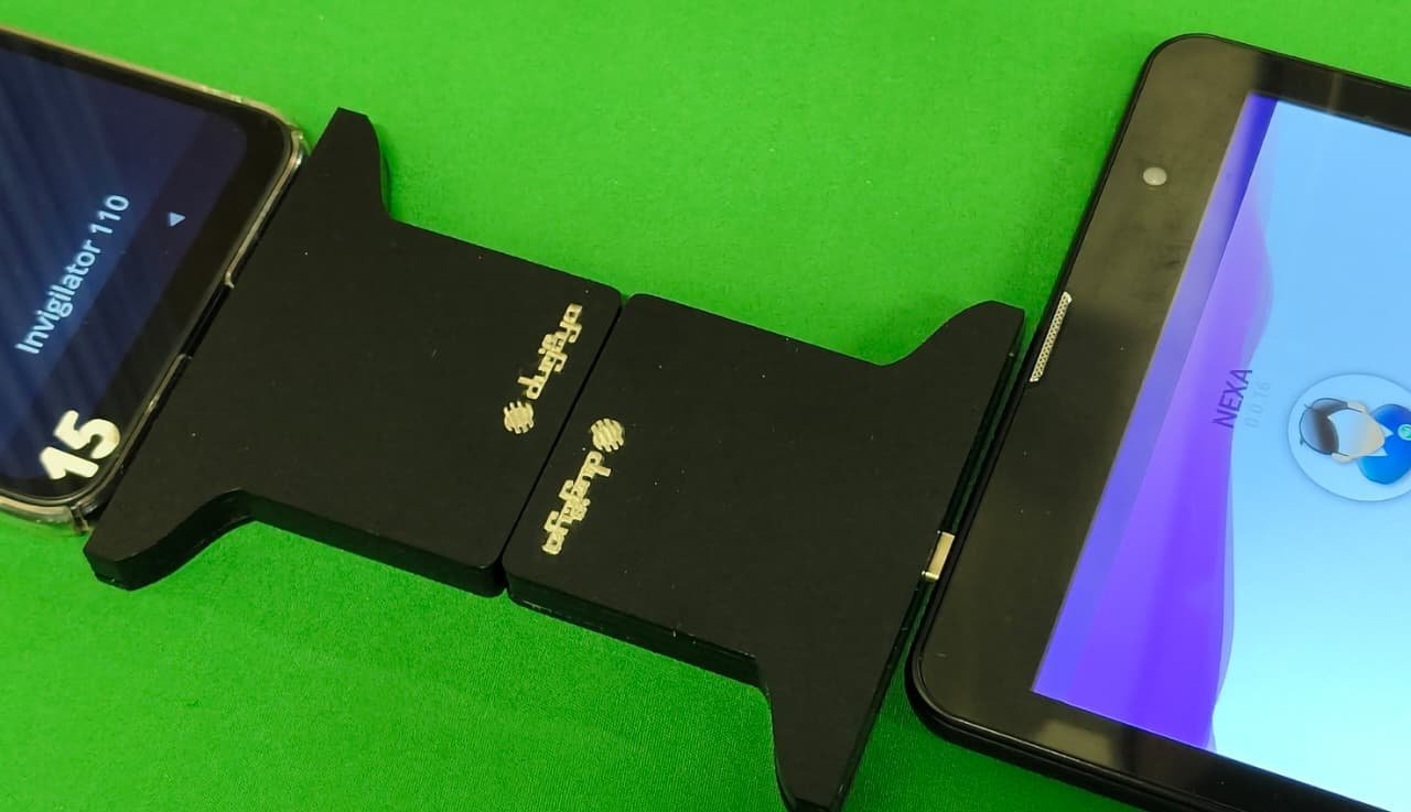 Close view of the seam where the two CORTEX Relay Cards meet, coplanar and touching along their edge faces