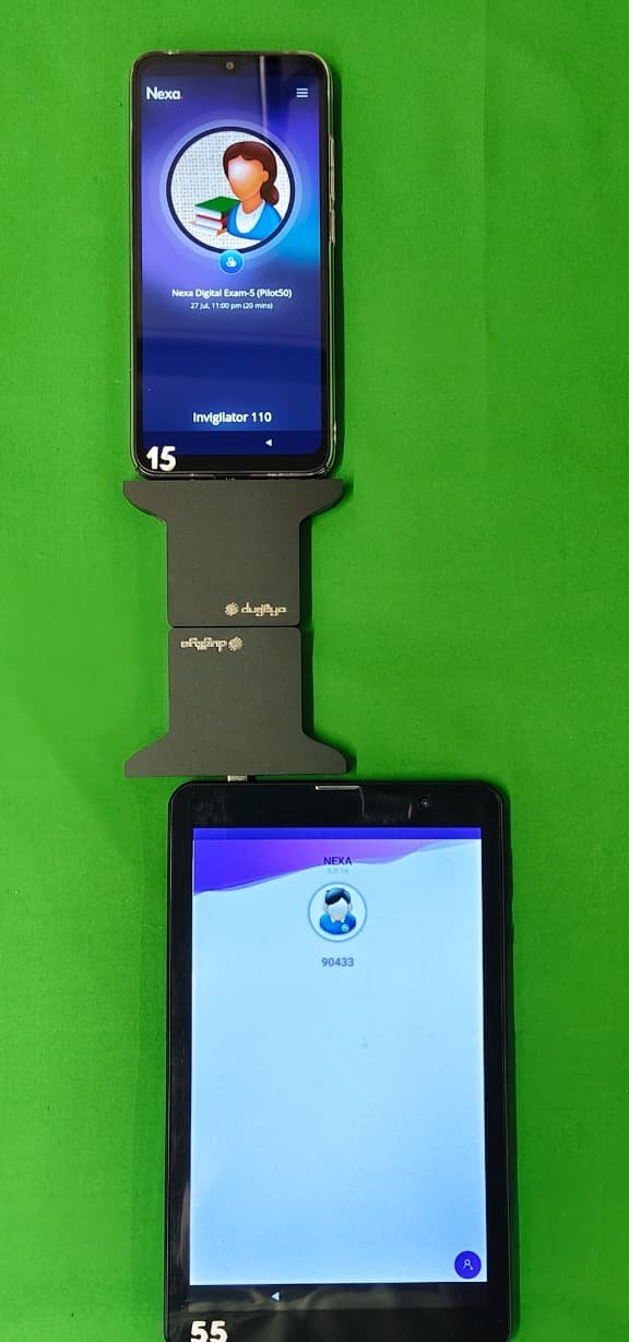 The two Relay Cards mated edge to edge, with the tablet now showing a bound candidate number